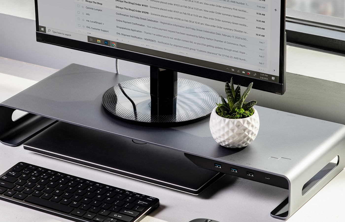 Optimize Your Workspace With This Monitor Riser’s 8-Port Hub for $130